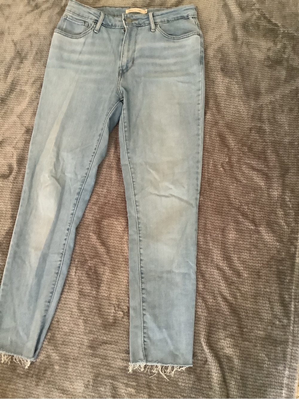 Levi's Light Blue Frayed High Rise skinny Ankle Jeans